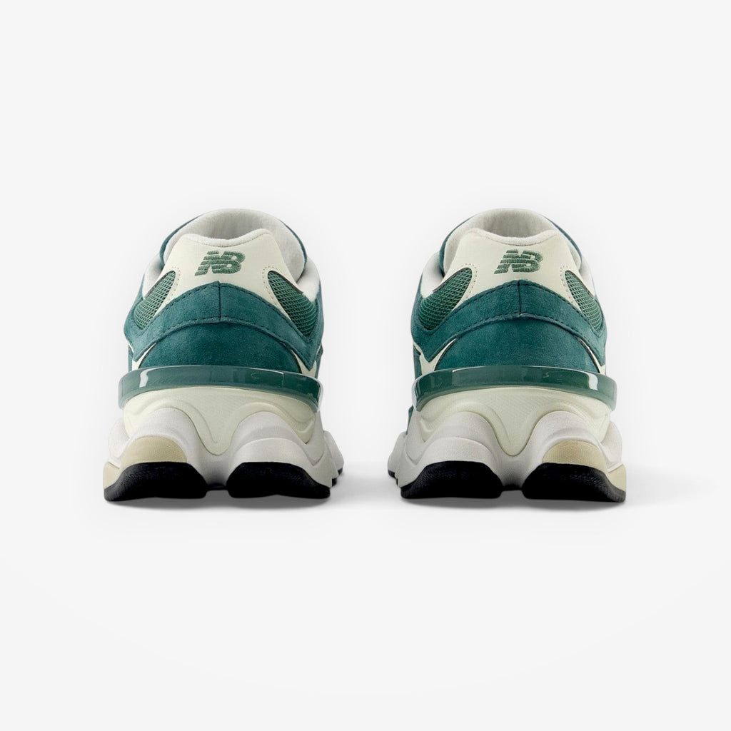 METRO New Balance 9060 New Spruce sneakers in green suede and mesh, rear view showing heel cushioning and branding.