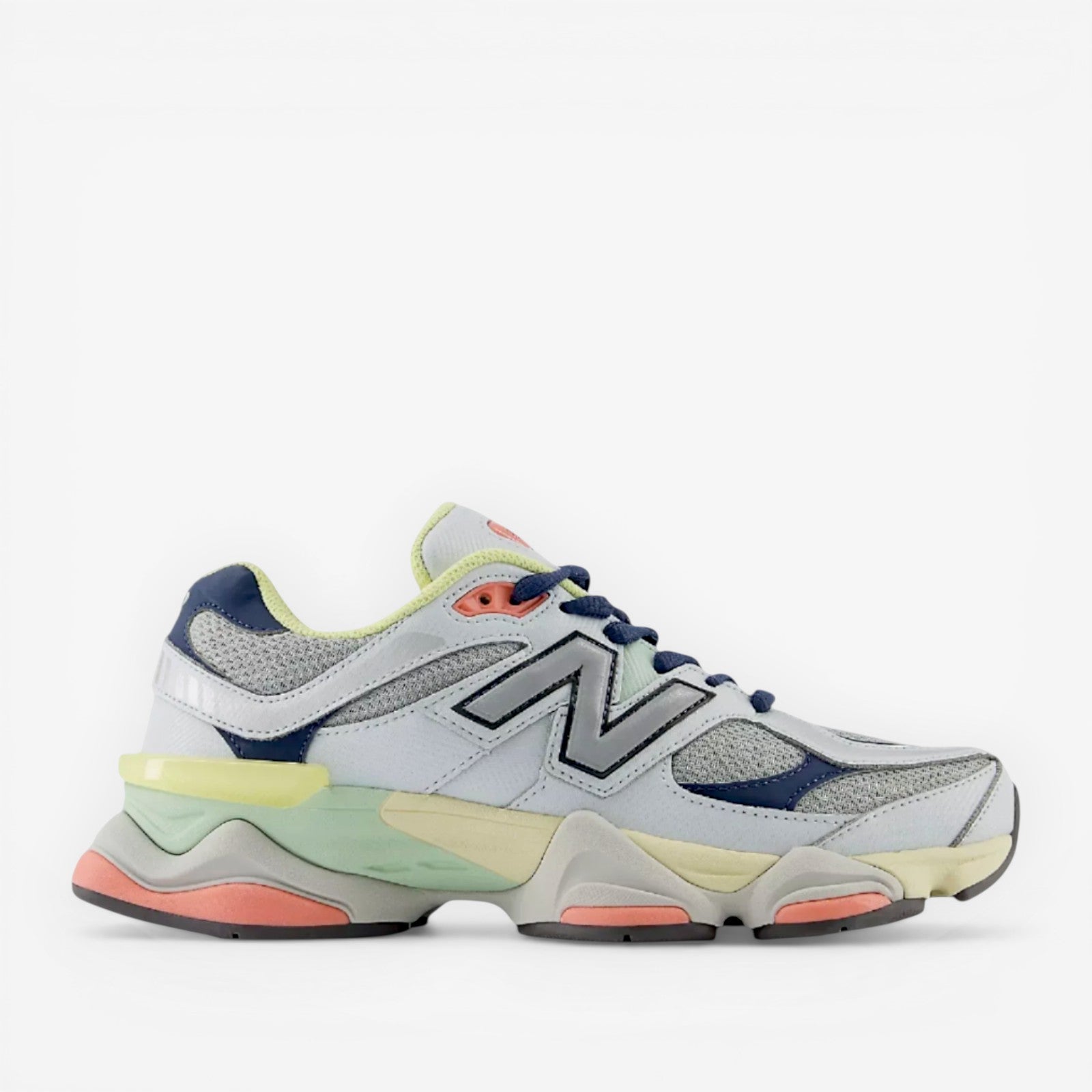 New Balance sneaker with mesh and leather panels, pastel accents, lifestyle footwear