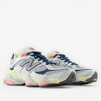 new balance sneakers in grey, navy, and pastel with mesh and suede panels, lifestyle footwear