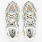 METRO New Balance 9060 sneakers in Lone Star Grey and Stonewear. Suede, mesh, and synthetic upper with ABZORB cushioning.