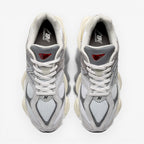 METRO New Balance 9060 sneakers in Rain Cloud, Castlerock, and White. Mesh and suede upper with ABZORB cushioning.