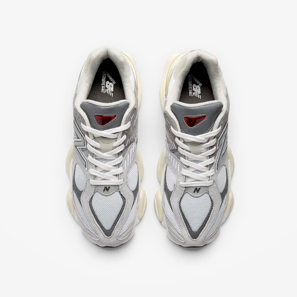 METRO New Balance 9060 Rain Cloud sneakers in grey and white with a chunky sculpted midsole and mesh upper