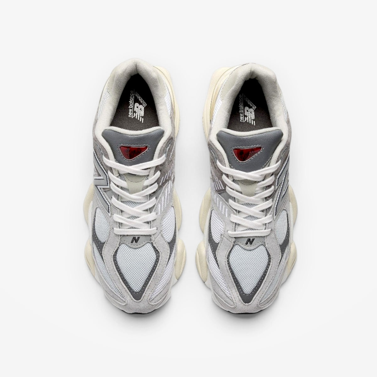 METRO New Balance 9060 Rain Cloud sneakers in grey and white with a chunky sculpted midsole and mesh upper