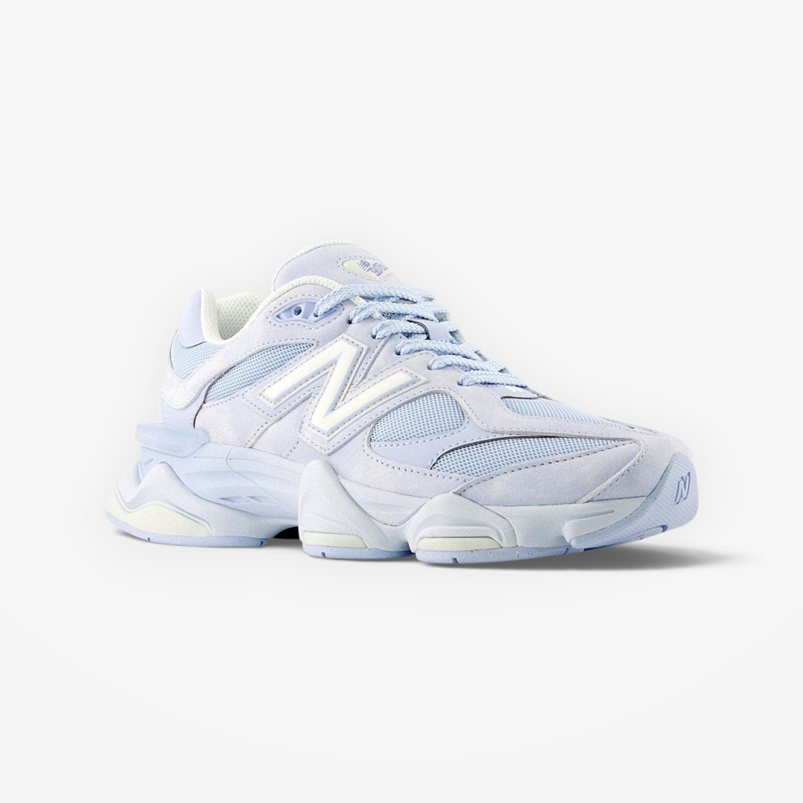 METRO New Balance 9060 sneakers in sea salt and oxford blue. Mesh and suede upper with ABZORB & SBS cushioning.