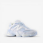 METRO New Balance 9060 sneakers in sea salt and oxford blue. Mesh and suede upper with ABZORB & SBS cushioning.