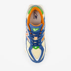 METRO New Balance U9060 Shoreline Blue sneaker featuring a multi-colored mesh and suede upper with Y2K aesthetic.