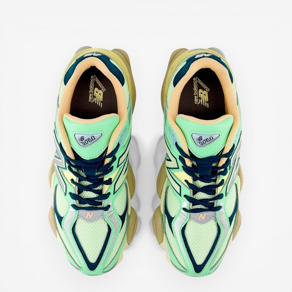 Top view of New Balance sneakers with mint green mesh, beige lining, and chunky sole
