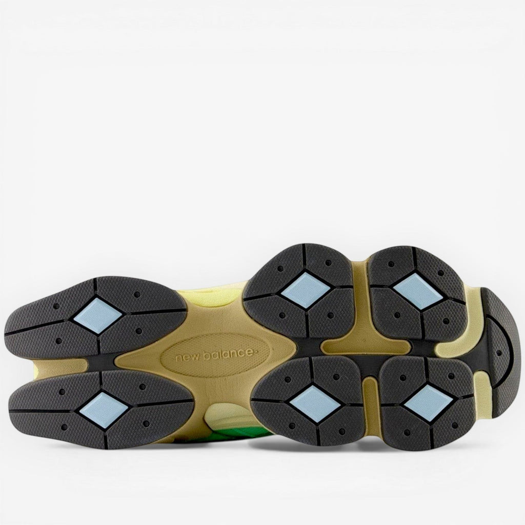 New Balance sneaker outsole with beige, black, and blue accents, part of footwear collection