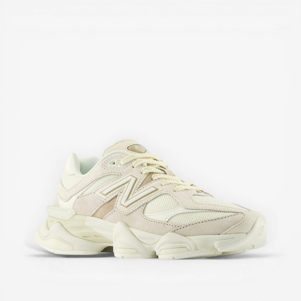 METRO New Balance 9060 unisex sneakers in white and gray, featuring mesh and suede overlays, ABZORB cushioning, and a rubber outsole.