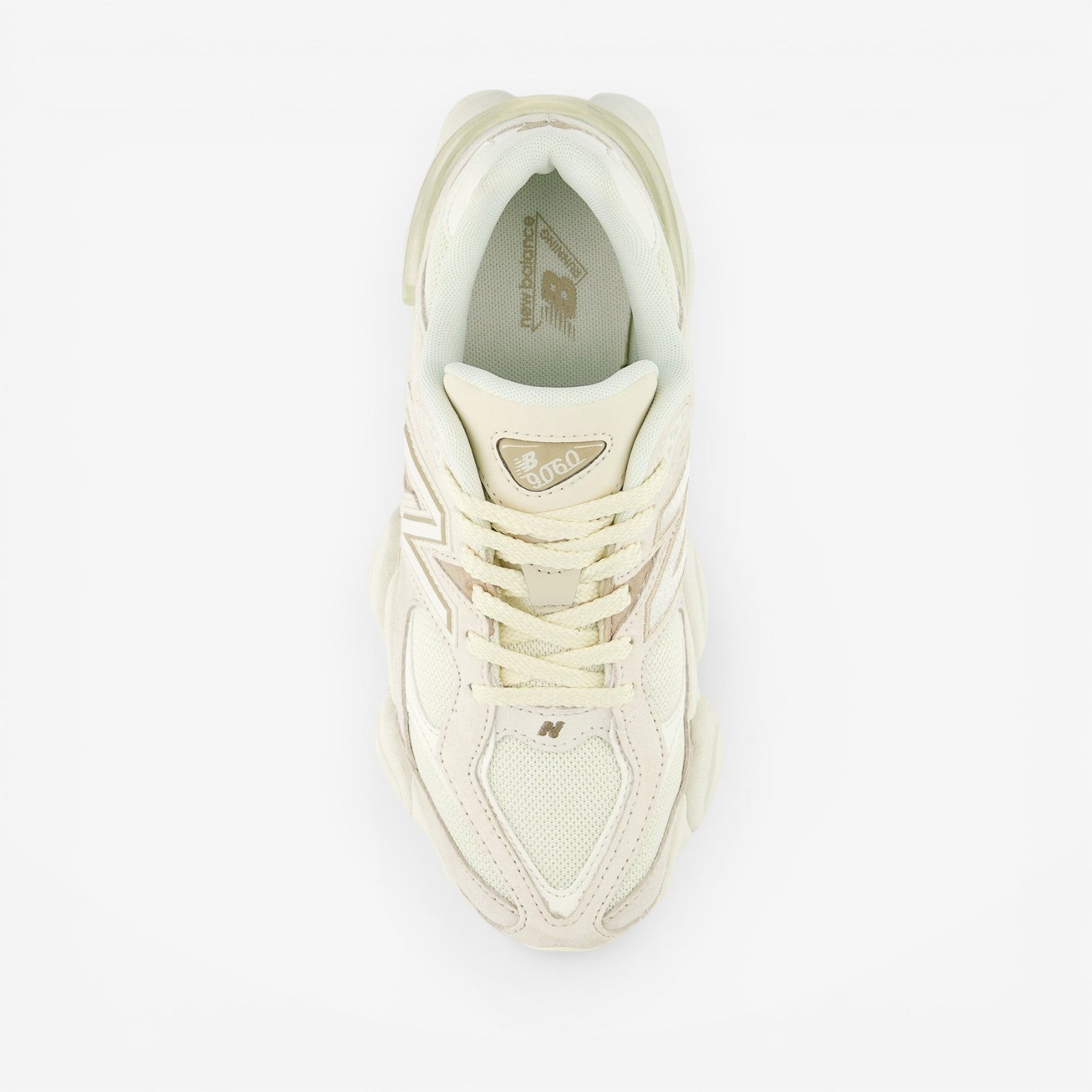 METRO New Balance 9060 sneakers in white and gray, featuring mesh and suede, ABZORB cushioning, and a rubber sole.