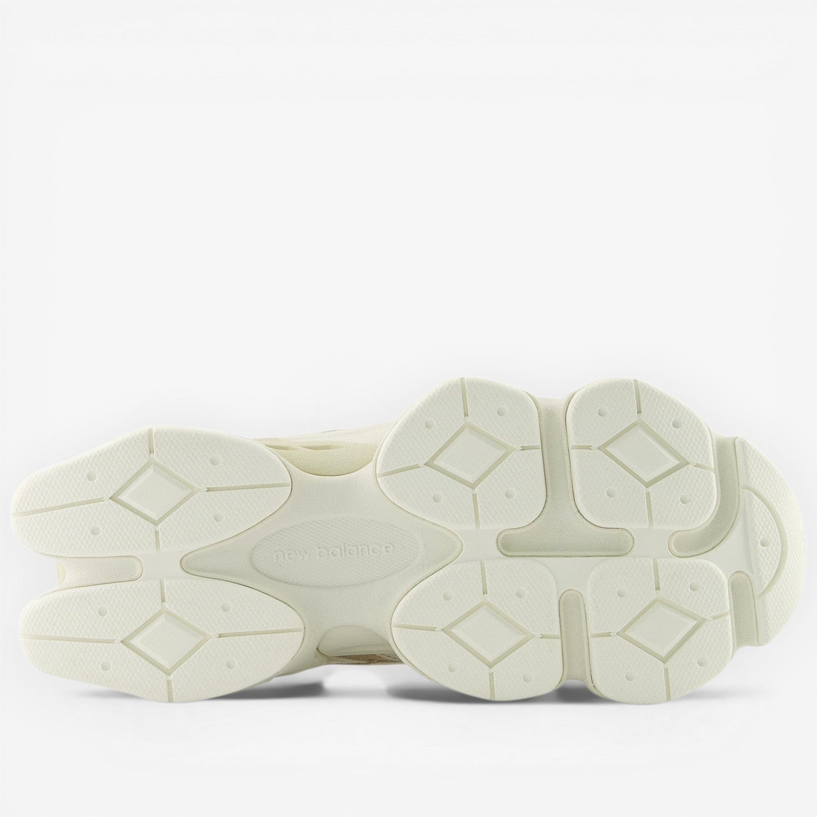METRO New Balance 9060 white and gray unisex lifestyle sneakers with mesh and suede upper.