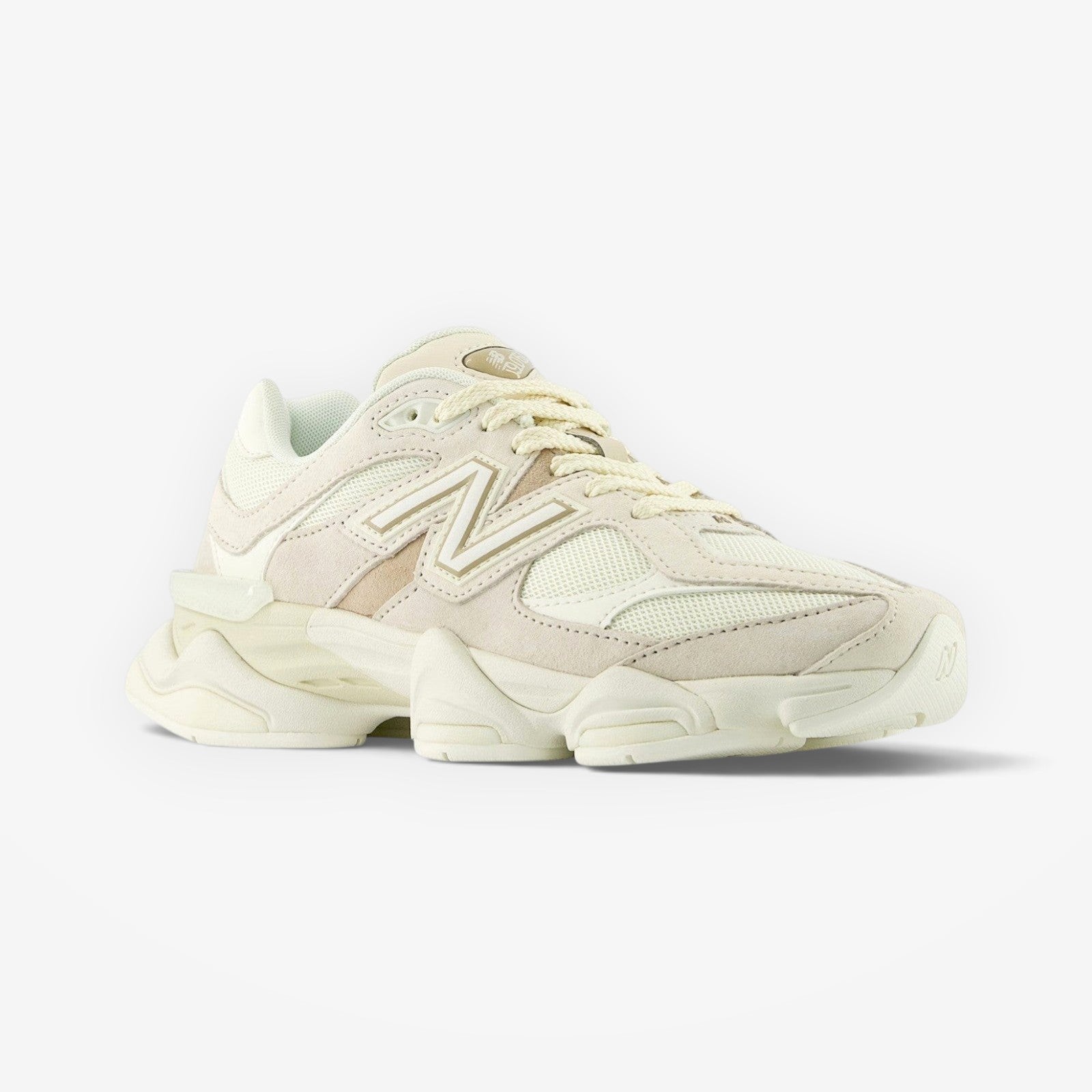 METRO New Balance 9060 unisex sneakers in white and gray, featuring mesh and suede overlays, ABZORB cushioning, and a rubber outsole.