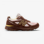 METRO New Balance 990v4 Made in USA sneaker in pumpernickel brown suede with pink chalk and alabaster mesh accents.