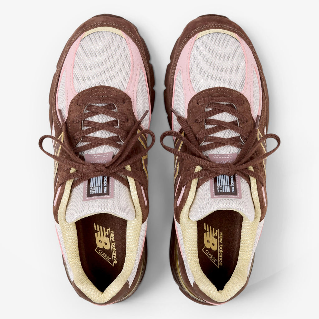 METRO New Balance 990v4 Made in USA sneakers in pumpernickel brown, pink chalk, and alabaster mesh, top view.