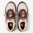 METRO New Balance 990v4 Made in USA sneakers in pumpernickel brown, pink chalk, and alabaster mesh, top view.