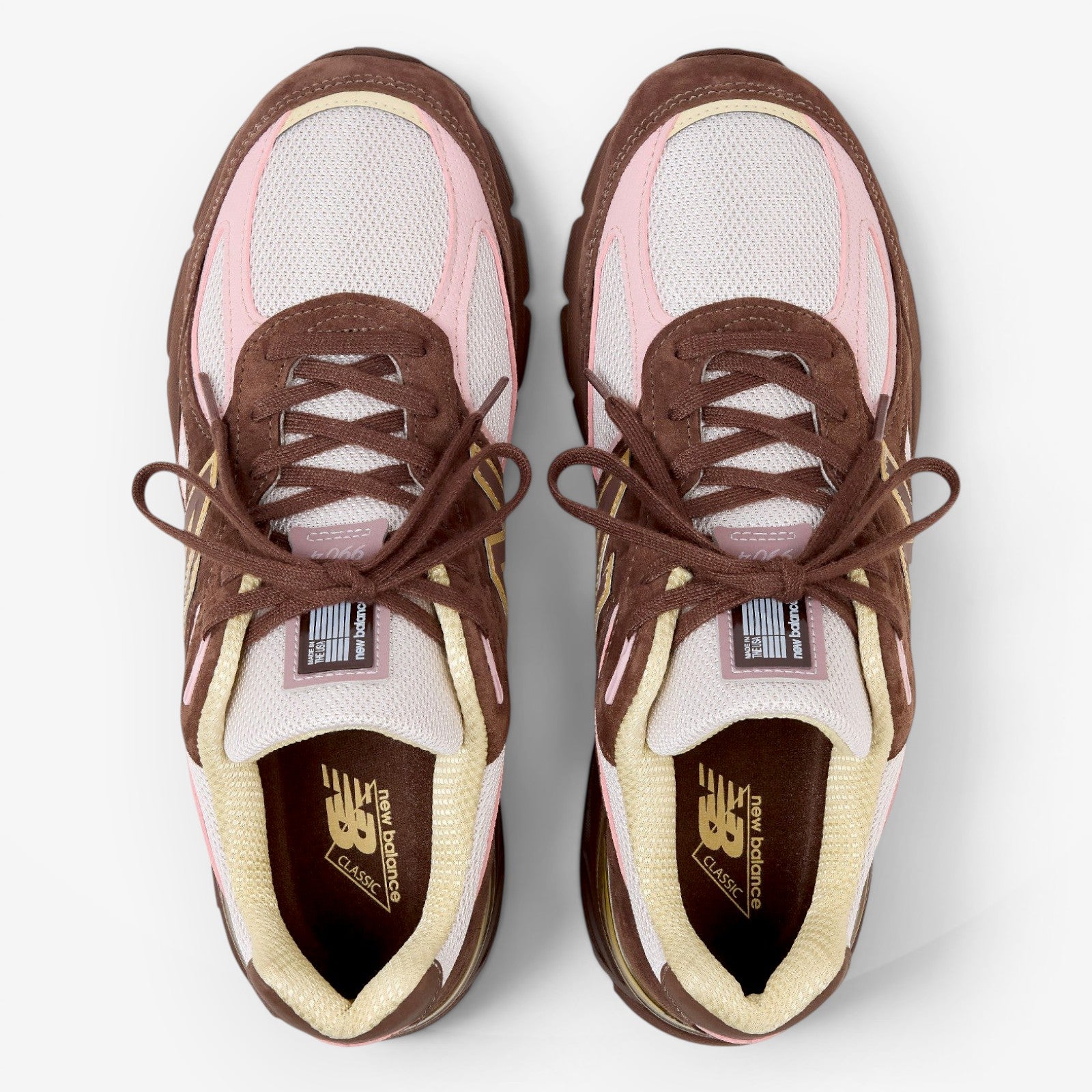 METRO New Balance 990v4 Made in USA sneakers in pumpernickel brown, pink chalk, and alabaster mesh, top view.