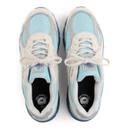 METRO New Balance 990v4 Made in USA sneakers in Moonbeam, Cloud Blue, and Magic Blue with suede overlays and mesh.