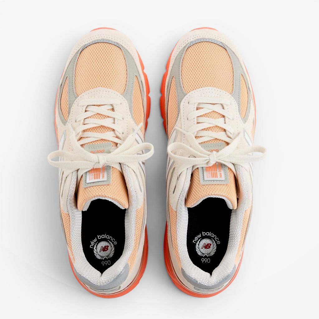 METRO New Balance 990v4 Made in USA sneakers in moonbeam, tangerine heat, and dried orange. Suede and mesh upper with ENCAP cushioning.