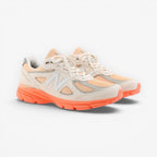 METRO New Balance 990v4 Made in USA sneakers in moonbeam, tangerine heat, and dried orange suede and mesh with ENCAP sole.