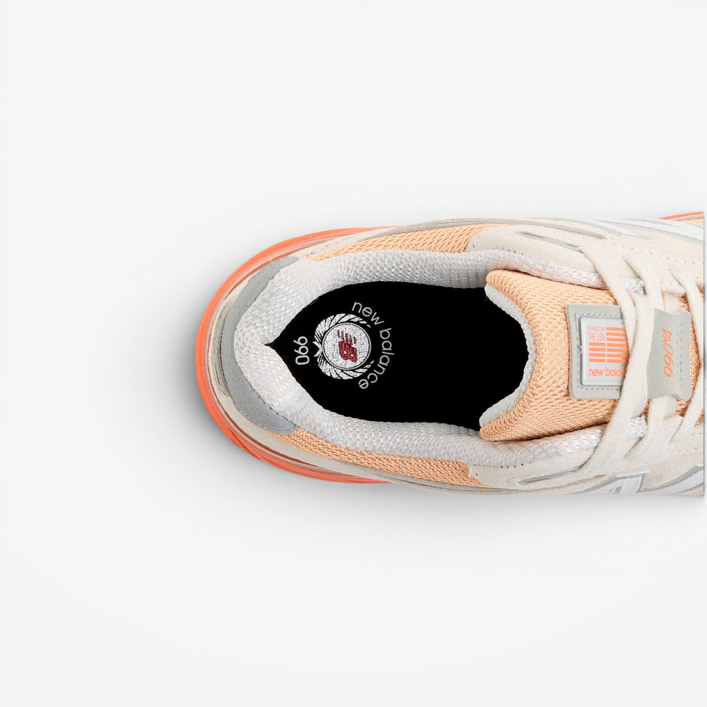 METRO New Balance 990v4 Made in USA sneakers in Moonbeam, Tangerine Heat, and Dried Orange. Suede and mesh upper.