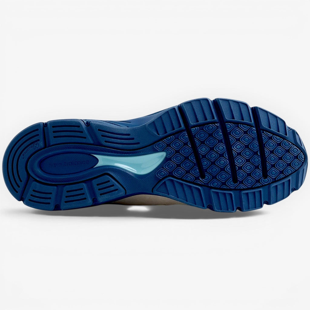 METRO New Balance 990v4 Made in USA sneakers in Moonbeam, Cloud Blue, and Magic Blue with rubber outsole.