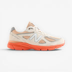 METRO New Balance 990v4 Made in USA sneakers in moonbeam, tangerine heat, and dried orange suede and mesh with ENCAP cushioning.