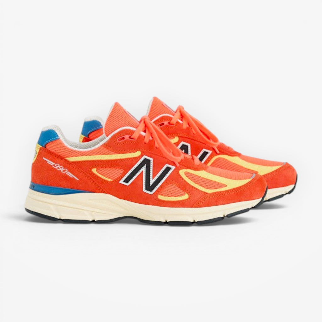 METRO New Balance 990v4 Made in USA Urgent Red Maize Afterglow suede and mesh running shoes.