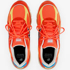 METRO New Balance 990v4 Made in USA Urgent Red Maize Afterglow suede and mesh running shoes.