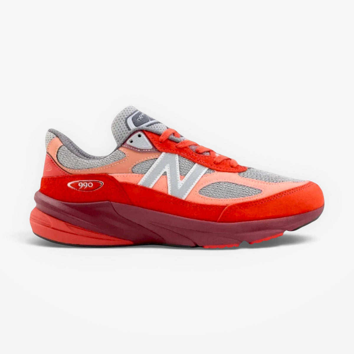 METRO New Balance 990v6 Community Red sneakers featuring mesh and suede overlays in vibrant red and pink tones.