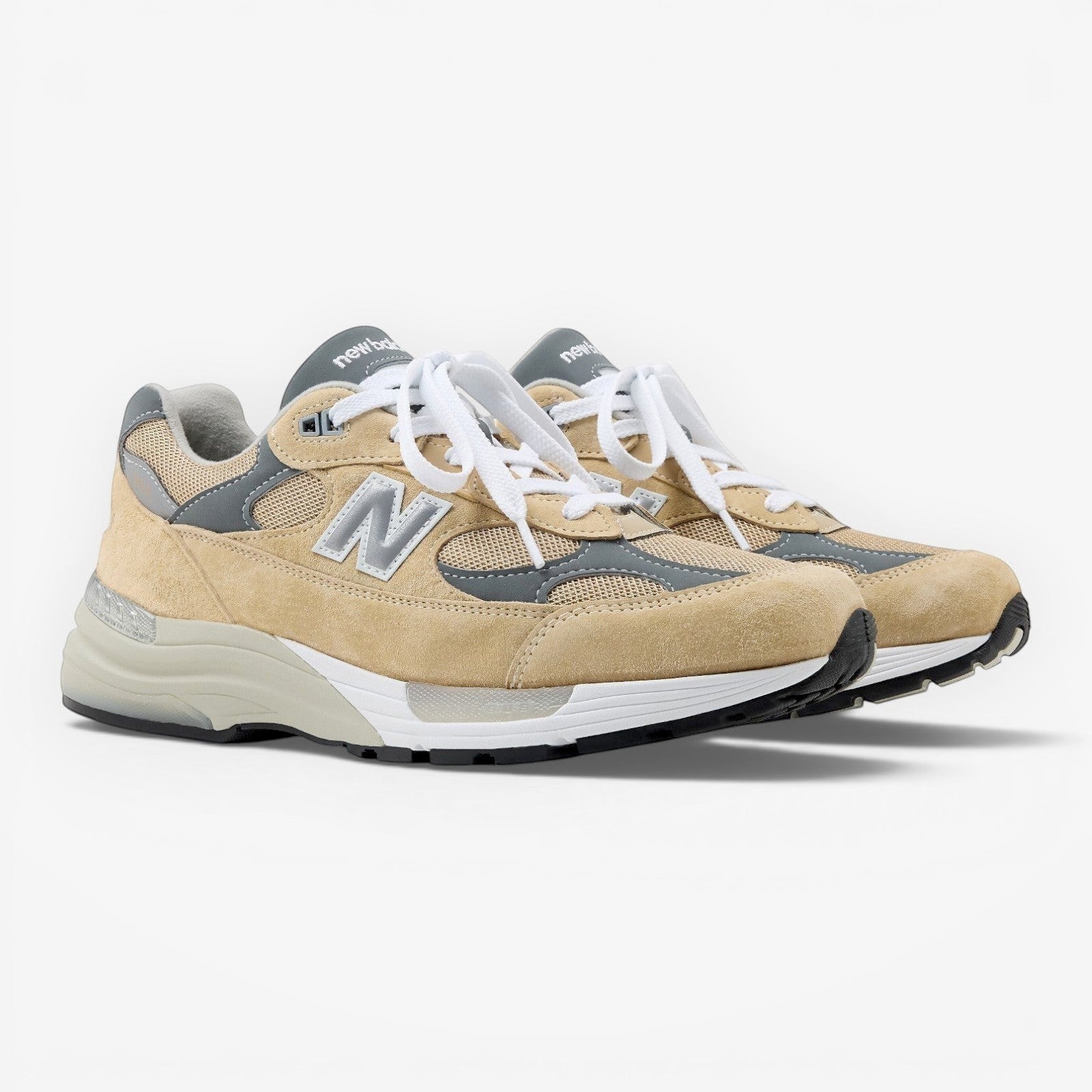 METRO New Balance 992 Made in USA sneakers in incense, white, and grey suede and mesh with ABZORB cushioning.