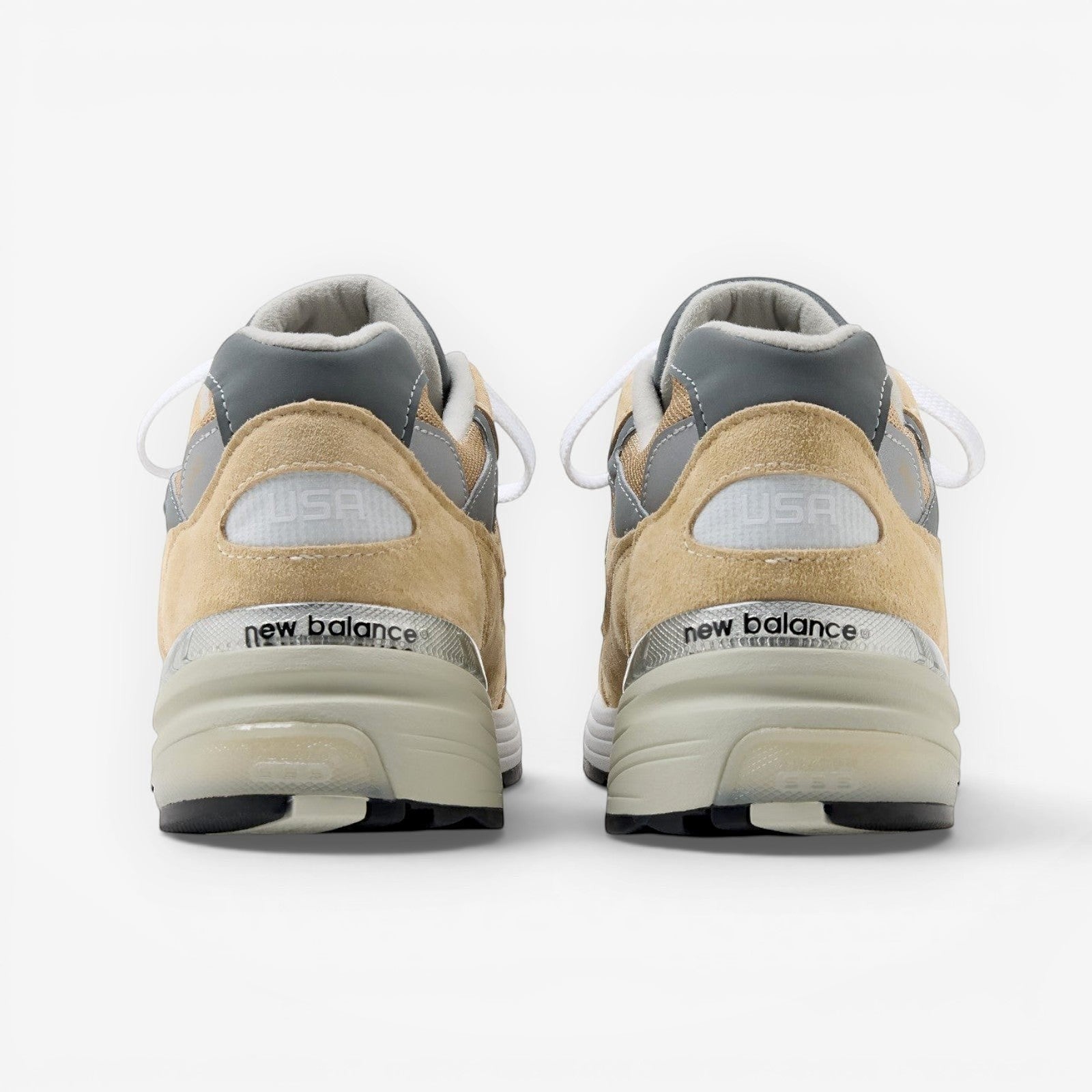 Rear view of METRO New Balance 992 Made in USA sneakers in incense, white, and grey suede and mesh with ABZORB heel.