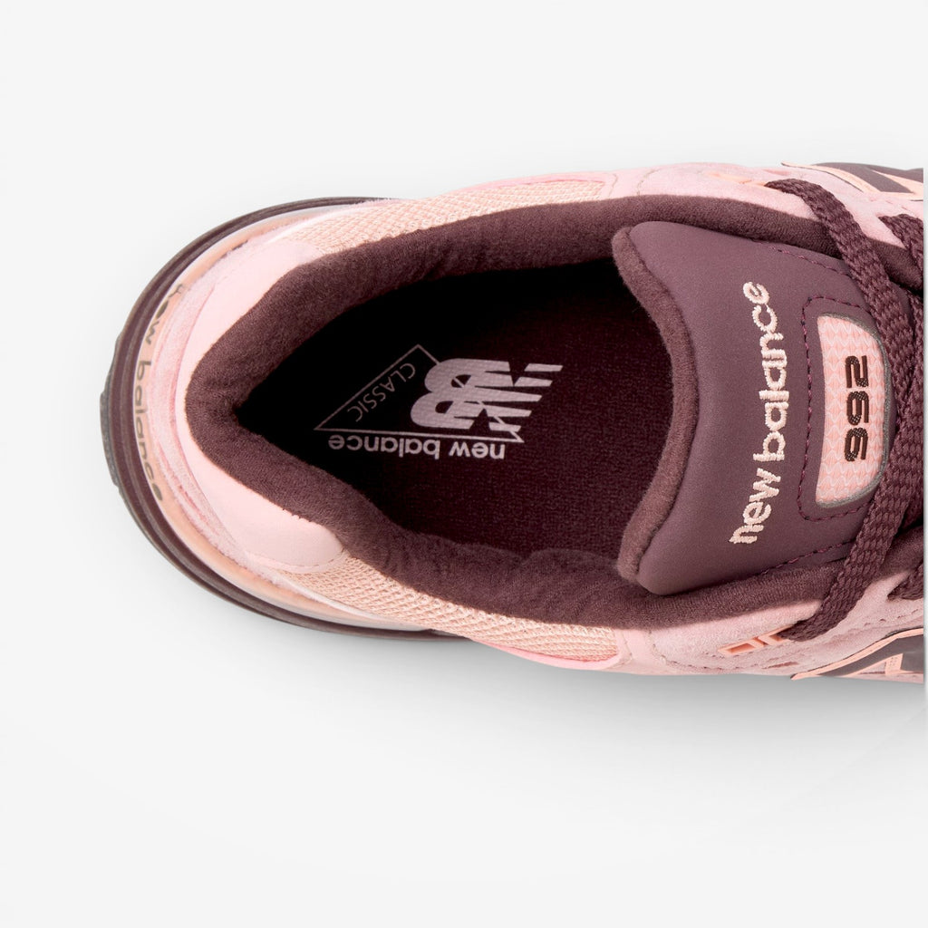 METRO New Balance 992 Made in USA sneaker in pink chalk and cherry leather with premium suede and mesh details.