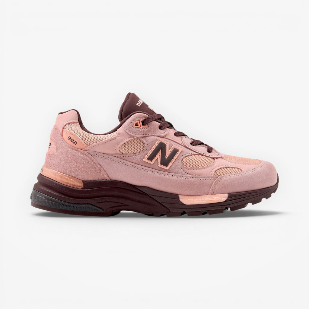 METRO New Balance 992 Made in USA sneaker in Pink Chalk suede and mesh with cherry leather accents and ABZORB midsole.