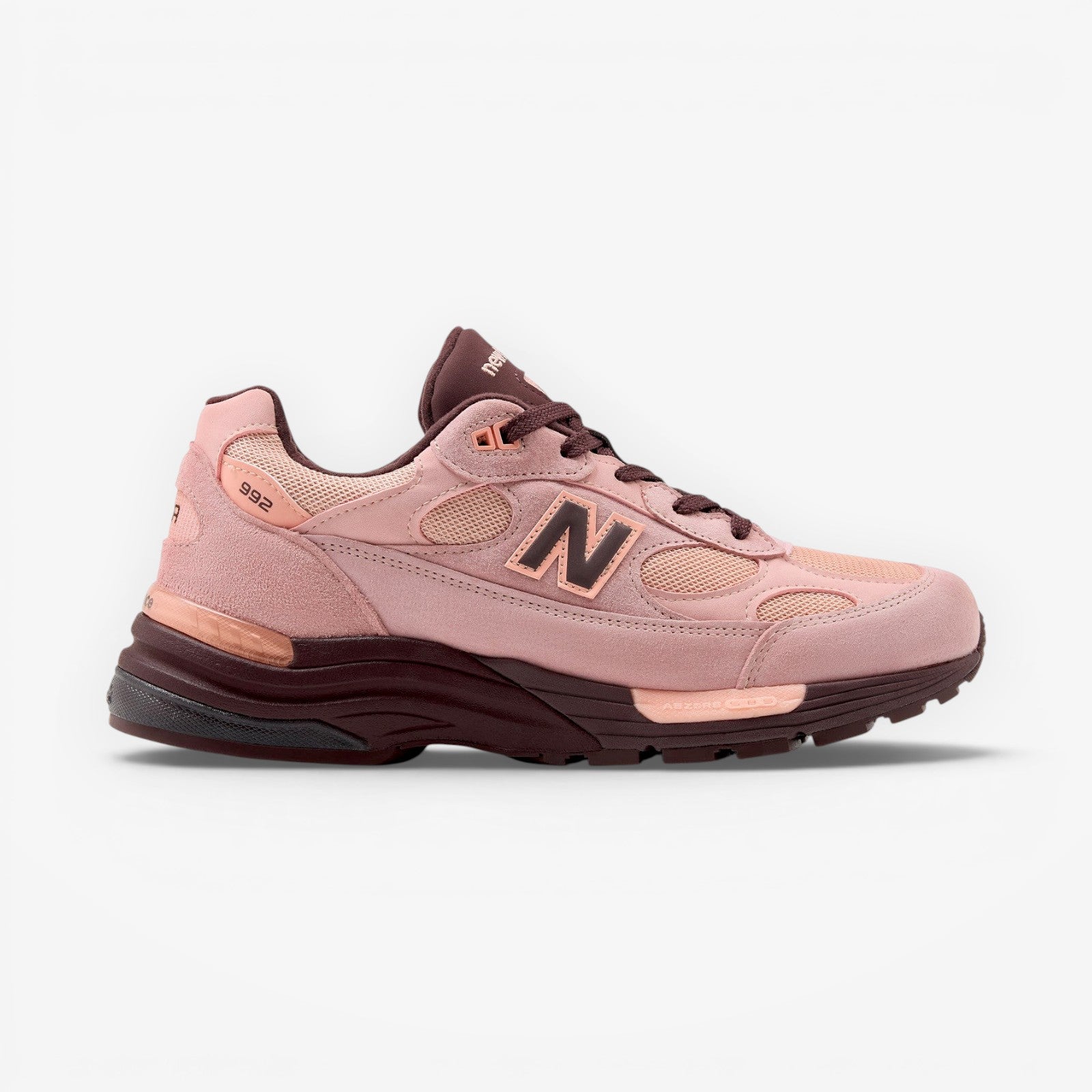 METRO New Balance 992 Made in USA sneaker in Pink Chalk suede and mesh with cherry leather accents and ABZORB midsole.