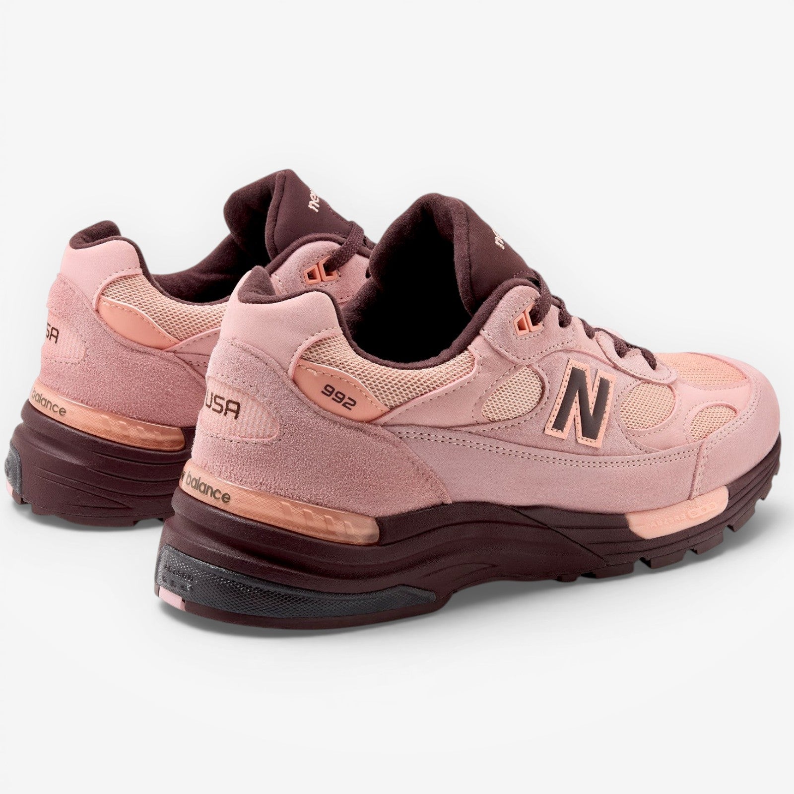METRO New Balance 992 Made in USA sneakers in pink chalk, pink lemonade, and cherry leather with suede and mesh.