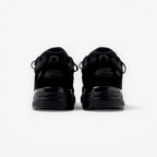 METRO New Balance 993 Made in USA sneakers in triple black suede and mesh, rear view showing heel branding.