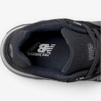 METRO New Balance 993 Made in USA sneaker in triple black featuring a branded insole and premium suede construction.
