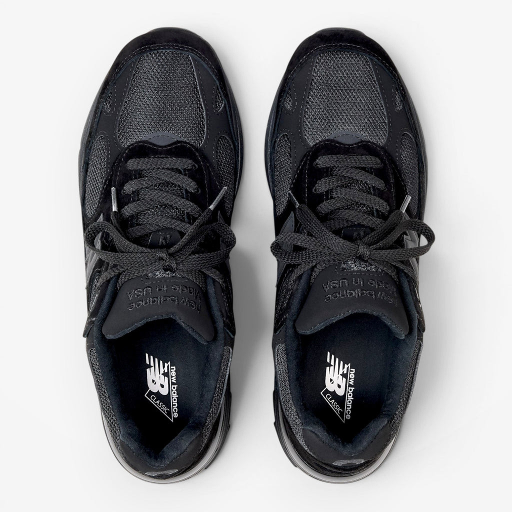 METRO New Balance 993 Made in USA sneakers in triple black featuring premium suede and mesh from a top-down view.