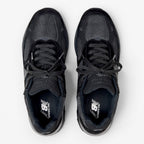 METRO New Balance 993 Made in USA sneakers in triple black featuring premium suede and mesh from a top-down view.