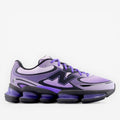 Purple New Balance sneaker on black background, mesh and synthetic, athletic footwear