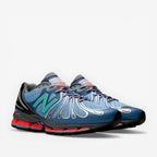 METRO Action Bronson x New Balance 1890 Medusa Azul blue mesh and suede lifestyle sneakers with teal N logo and red accents.
