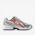 White running shoe with red accents on a white background