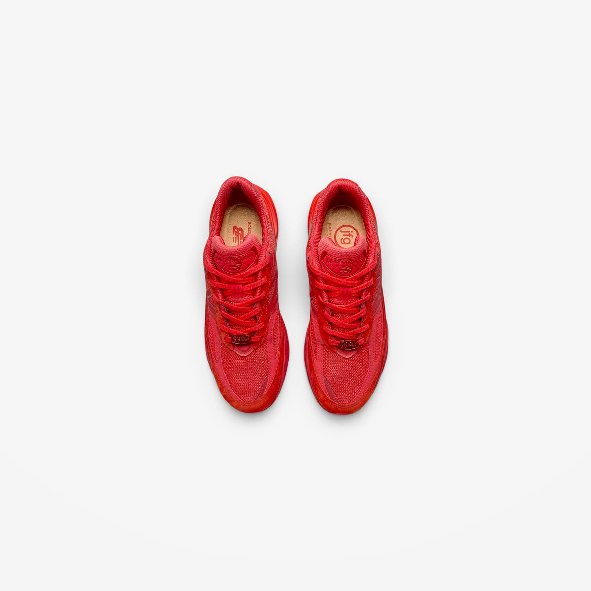 METRO New Balance 990v6 Joe Freshgoods Paris Red sneakers in vibrant red mesh and suede, top-down view.