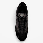 METRO New Balance M1000 black sneakers with mesh underlays and ABZORB cushioning, top-down view.