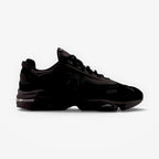 METRO New Balance M1000 black sneakers with mesh underlays, sleek overlays, and ABZORB cushioned segmented sole.