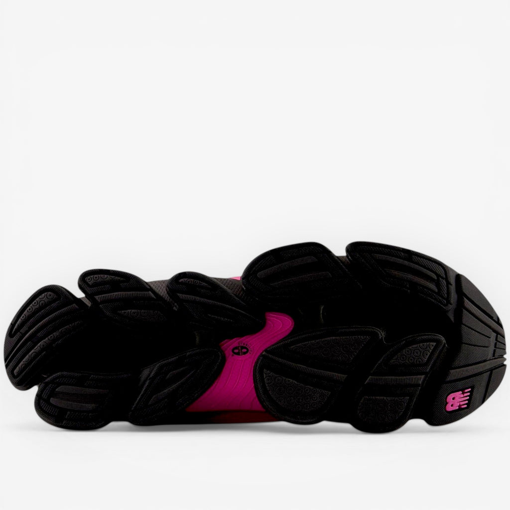 METRO New Balance ABZORB 2000 Pink Heat women's running shoes with black rubber sole and pink accents.