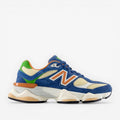 New Balance U9060 sneaker in blue, cream, green, and orange with mesh and suede details