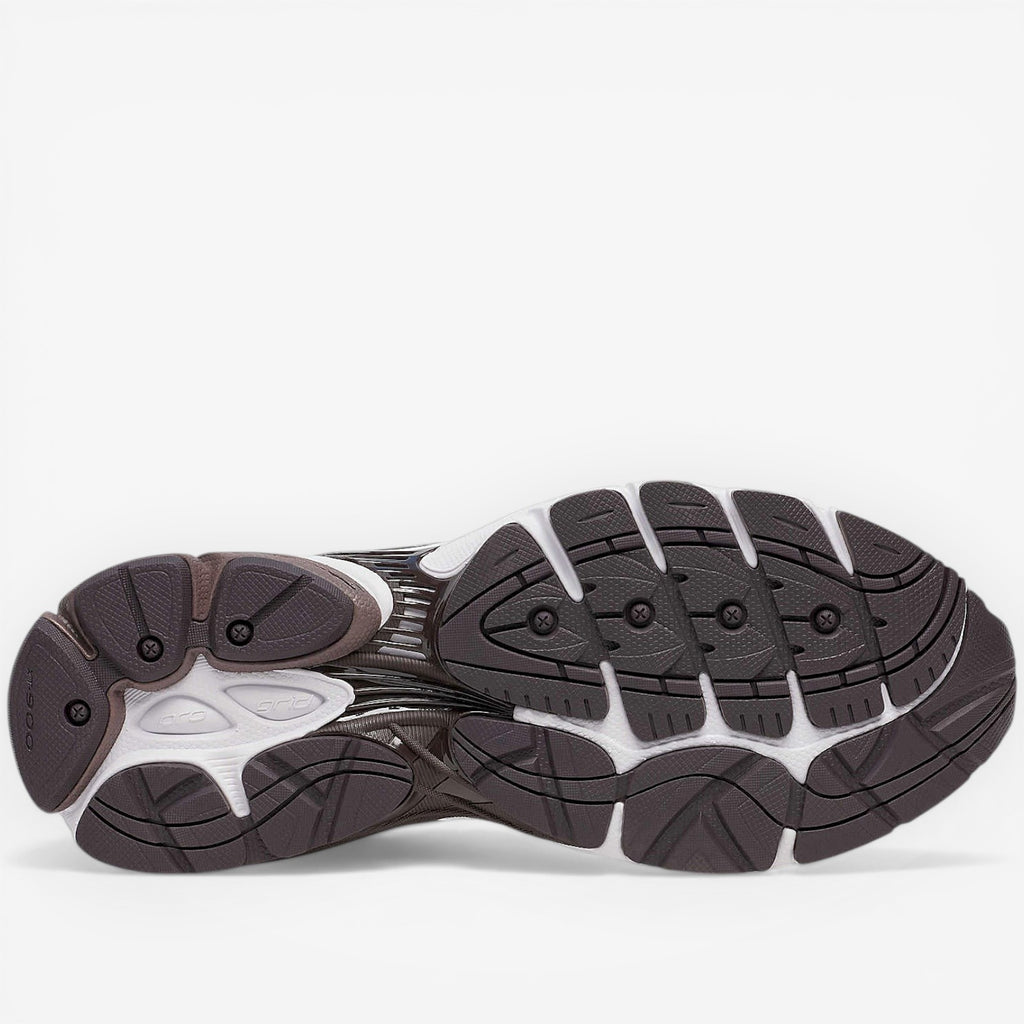 METRO ProGrid Omni 9 retro runner sneakers in brown, white, and silver with breathable mesh and ProGrid cushioning.