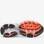 METRO ProGrid Omni 9 men's retro running shoes in grey mesh with silver overlays, teal accents, and orange outsole.