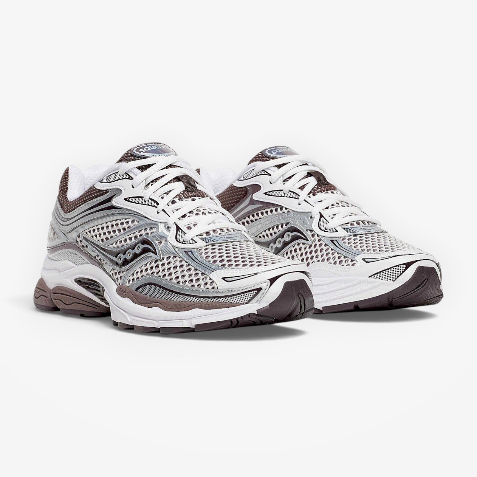 METRO ProGrid Omni 9 white and brown mesh and synthetic retro running shoes with silver accents.